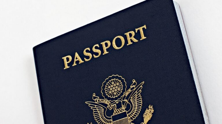 United States passport book cover in an archival photograph, illustrating US passport renewal online.